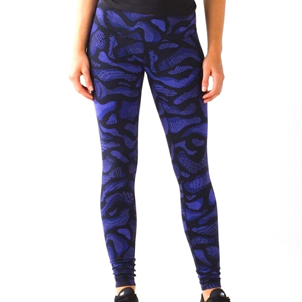 Lululemon leggings w/ purple & black designs, w/  hidden inner hip pocket.